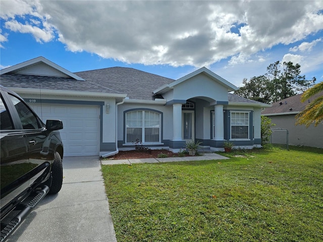 ranch-style home with a garage and a front yard