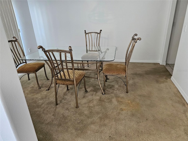 view of carpeted dining space