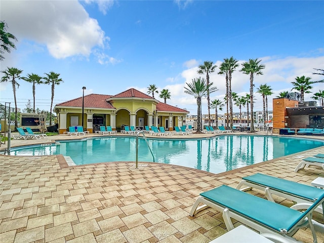 pool with a patio area