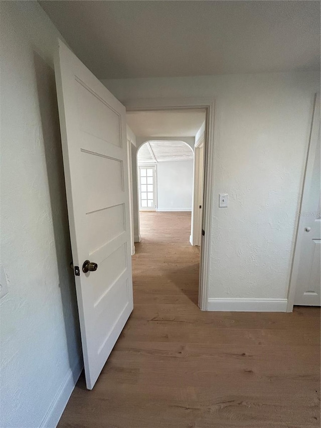 hall featuring light hardwood / wood-style floors