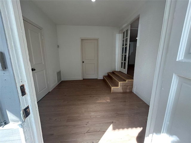 hallway with light wood-type flooring