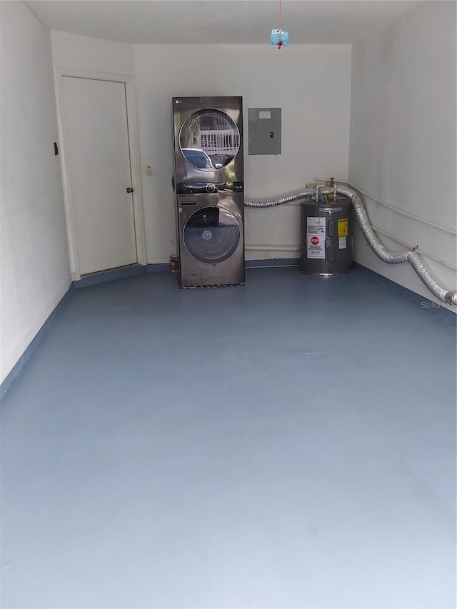 garage with electric water heater and washer / dryer