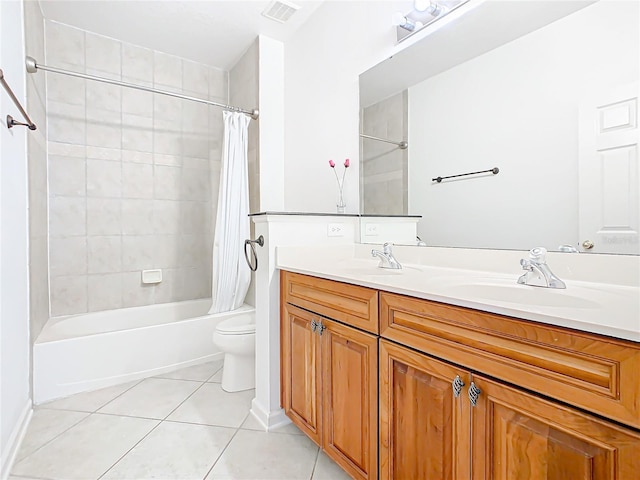 full bathroom featuring tile patterned floors, vanity, toilet, and shower / bathtub combination with curtain