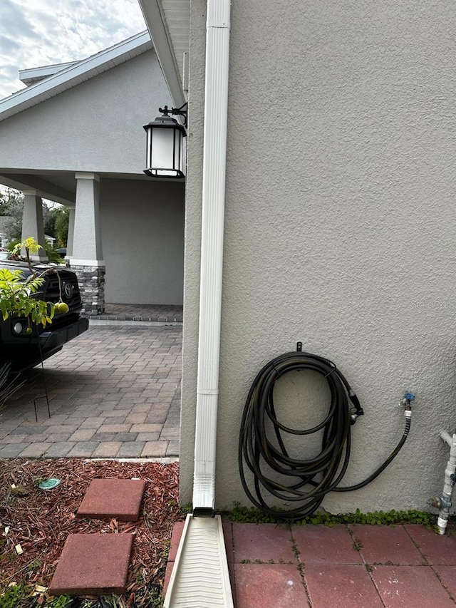 exterior space featuring stucco siding