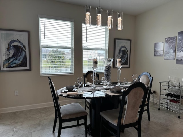 dining area with light tile patterned flooring