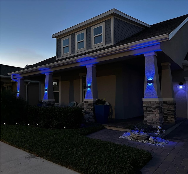 view of front of home featuring covered porch