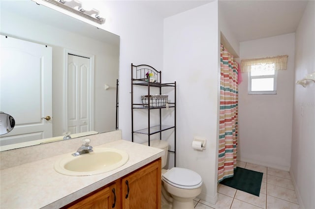 bathroom with vanity, toilet, a shower with curtain, and tile patterned flooring