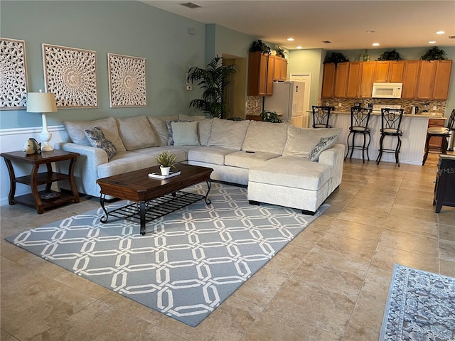 living room with light tile patterned floors