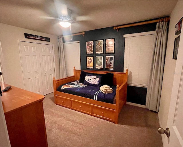 carpeted bedroom with ceiling fan