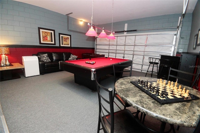 recreation room with light carpet and pool table