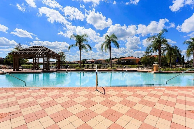 view of swimming pool with a gazebo