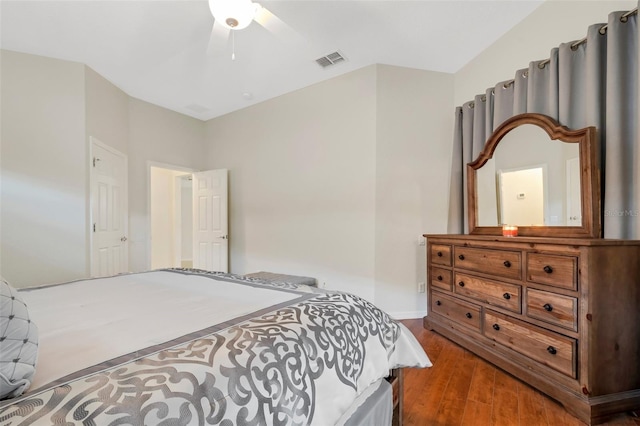 bedroom featuring dark hardwood / wood-style floors and ceiling fan