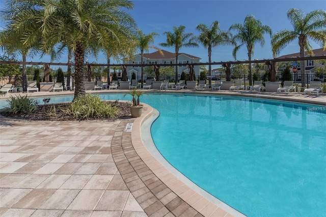 view of swimming pool with a patio