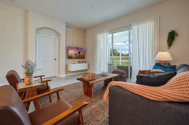 living area featuring light tile floors