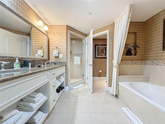 bathroom with vanity, tile patterned floors, and independent shower and bath