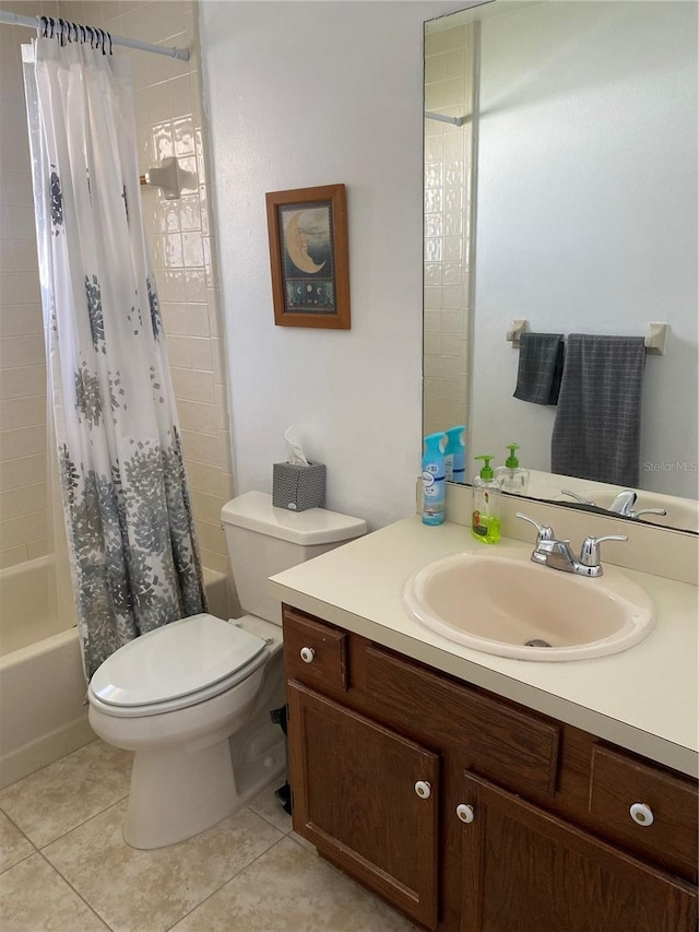 full bathroom with shower / bath combination with curtain, tile floors, toilet, and vanity