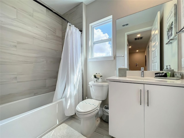 full bathroom with toilet, vanity, shower / tub combo with curtain, and tile flooring