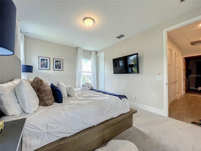 bedroom with light hardwood / wood-style flooring