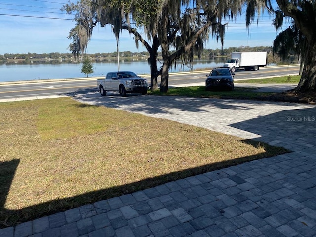 view of yard with a water view