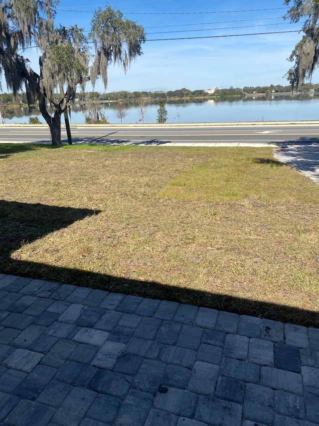 view of yard with a water view