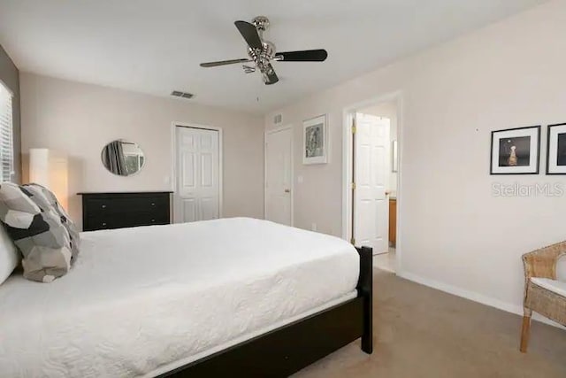 bedroom with light carpet and ceiling fan