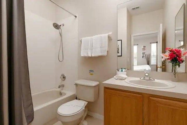 full bathroom with toilet, vanity, and shower / bathtub combination with curtain