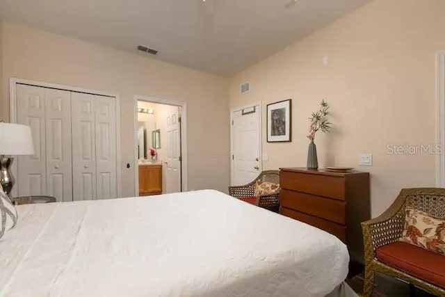 bedroom featuring a closet and ensuite bathroom