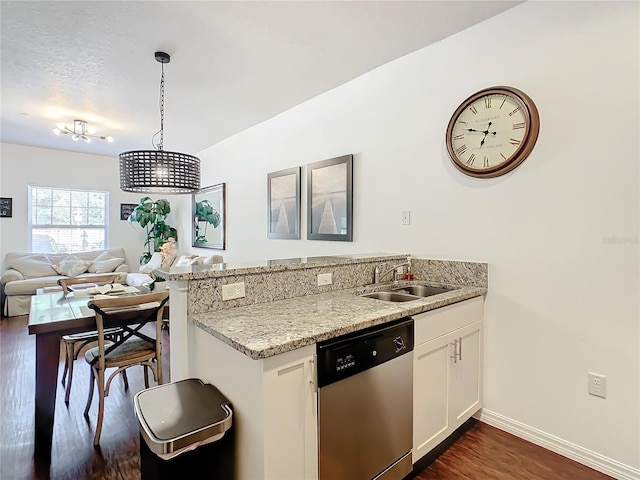 kitchen featuring white cabinetry, dark hardwood / wood-style floors, dishwasher, and sink