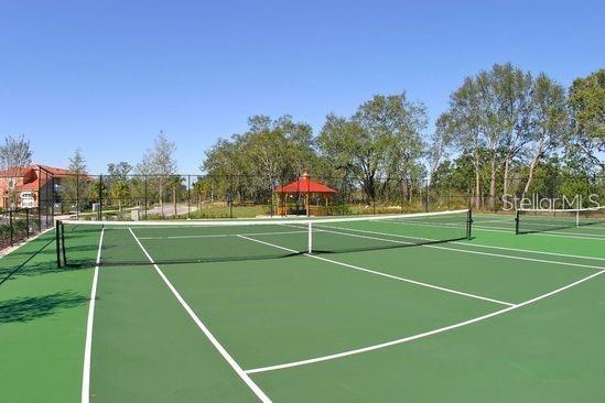 view of sport court with a gazebo