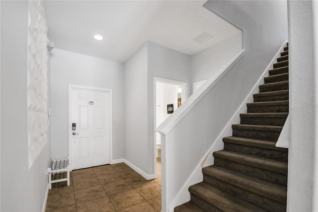 entrance foyer with tile floors