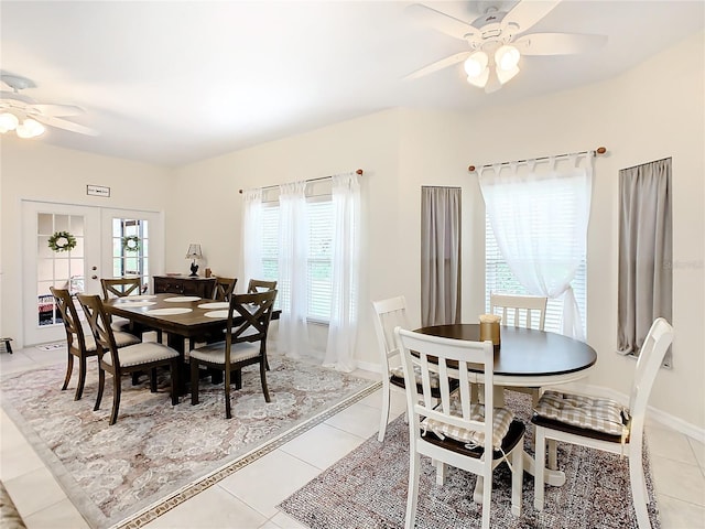 dining room with french doors, ceiling fan, and a wealth of natural light