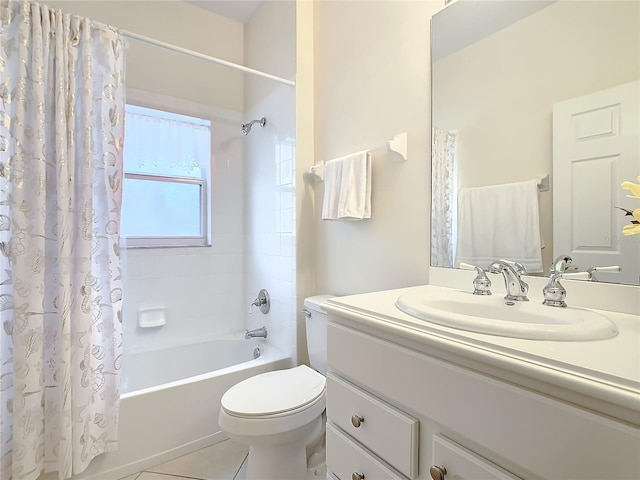 full bathroom featuring oversized vanity, toilet, shower / tub combo, and tile floors