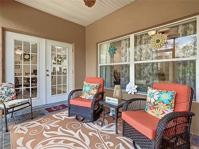 sunroom featuring french doors