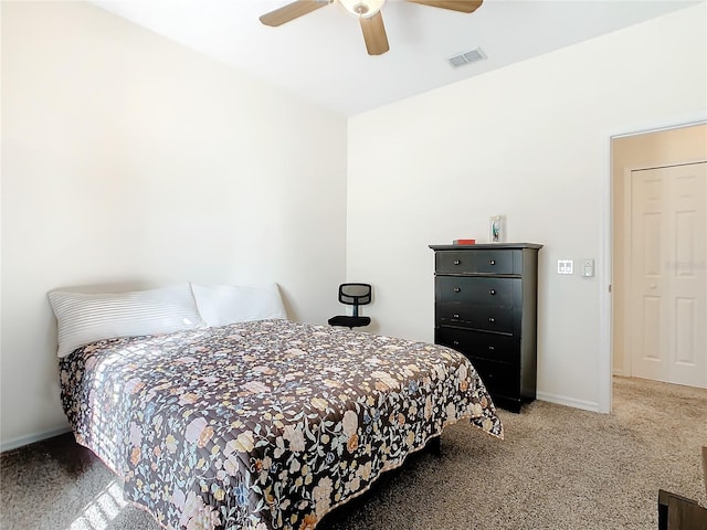 bedroom featuring light colored carpet and ceiling fan