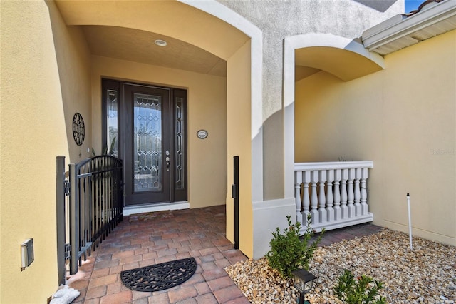 entrance to property with covered porch