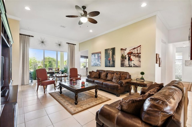 tiled living room featuring ornamental molding and ceiling fan