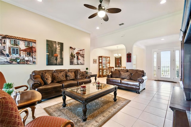 living room featuring crown molding, ceiling fan with notable chandelier, and light tile floors