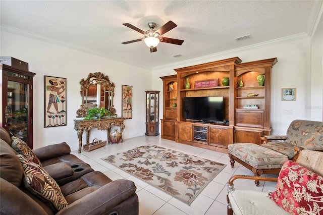 tiled living room featuring a textured ceiling, ceiling fan, and ornamental molding