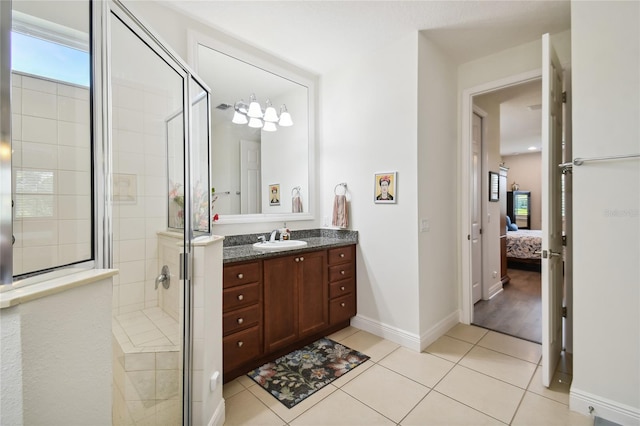 bathroom featuring vanity, a shower with shower door, and wood-type flooring