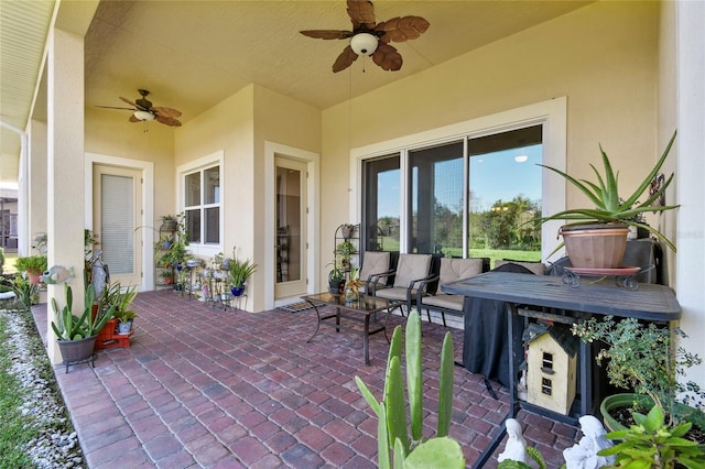 view of patio with ceiling fan