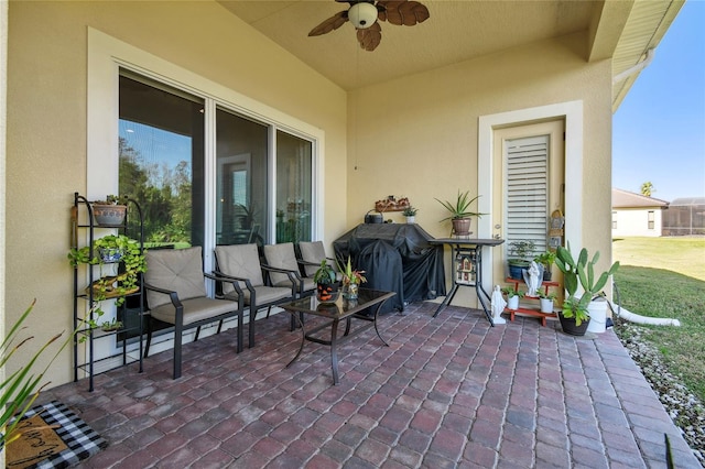 view of patio featuring ceiling fan