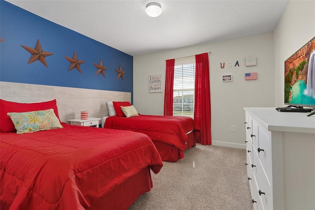 bedroom with light colored carpet