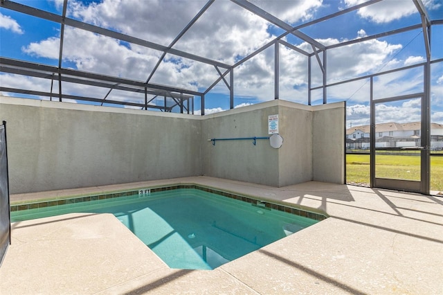 view of pool featuring a patio and a lanai