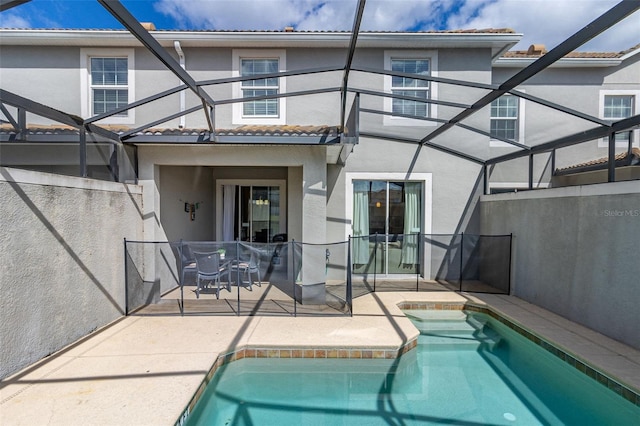 view of swimming pool with a patio area