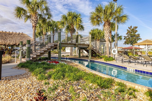 view of swimming pool featuring a gazebo