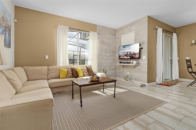 living room featuring tile walls