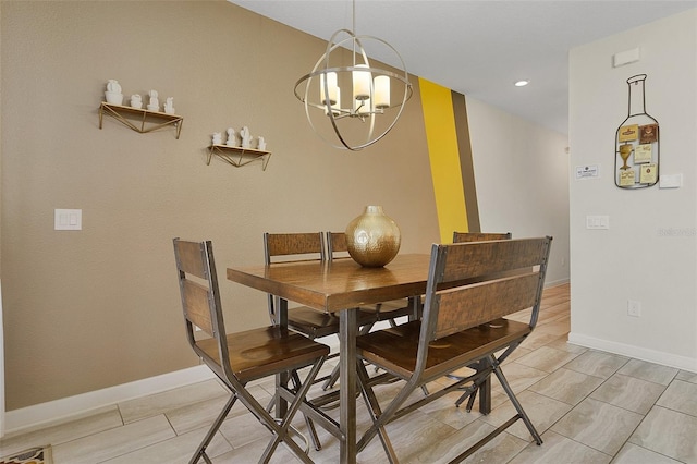 dining area with an inviting chandelier