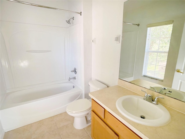 full bathroom featuring vanity, tile floors, toilet, and tub / shower combination