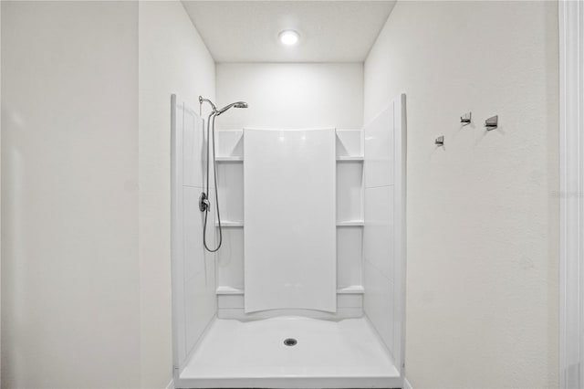 bathroom featuring a shower