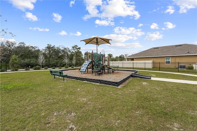 view of jungle gym featuring a lawn